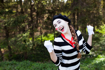 Fototapeta premium Emotional Mime on the park background