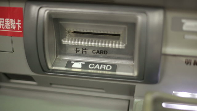 Bankcard being ejected from ATM machine