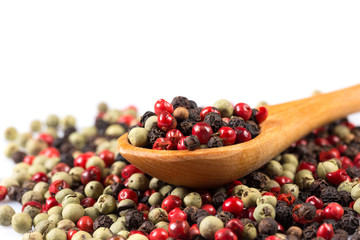 Pepper seasoning mix in wooden spoon