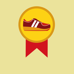 tennis shoes over gold stamp over yellow color bakground