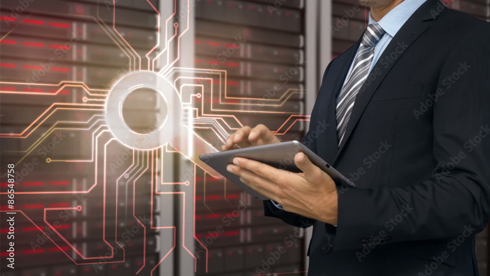 Poster businessman using tablet in front of locked server