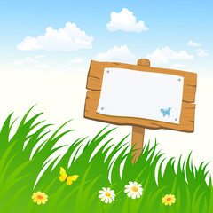 Signboard in the grass