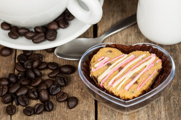 Cup of coffee , heart shaped cookies