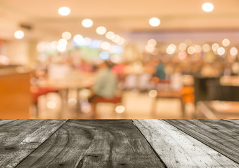 Coffee shop blur background with bokeh image .