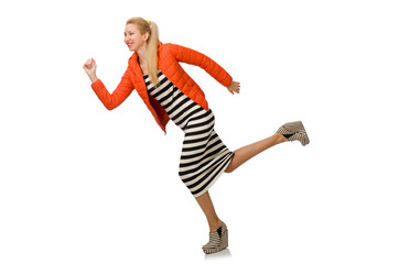 Young woman in long striped dress isolated on white