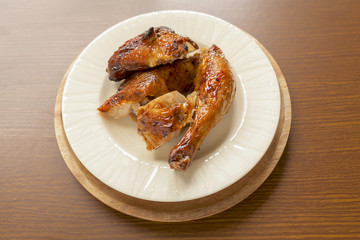 Grill chicken thai style on wood background