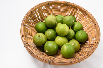 green lime in basket