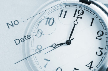 Vintage blue clock face and diary note composite