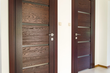 Two pair of brown wooden doors