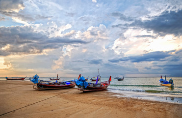 Obraz premium Sunset in Kamala bay in Thailand, island Phuket. In december 2004 this place was affected by tsunami