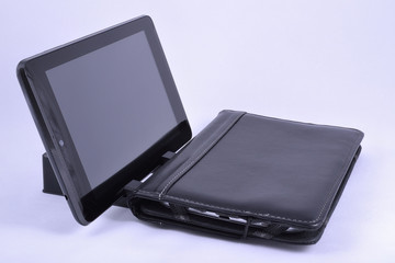tablet at support and tablet at the black case