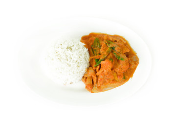 Porks in ground peanut-coconut cream curry with rice