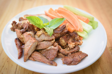 Delicious smoked pork with basil and vegetable