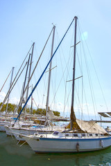 Boats in marina in Geneva lake bay harbor in Lausanne, Switzerla