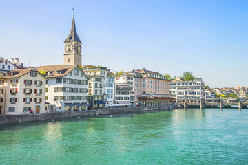 Fototapeta na wymiar Zurich city center and quay of Limmat in summertime