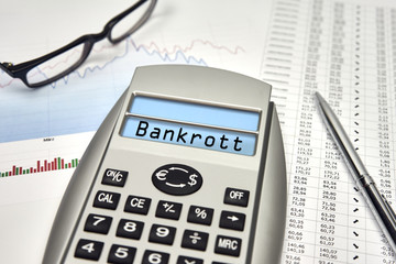 Taschenrechner mit BANKROTT und Textfreiraum, blau