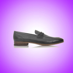 Fashion concept with male shoes against gradient 