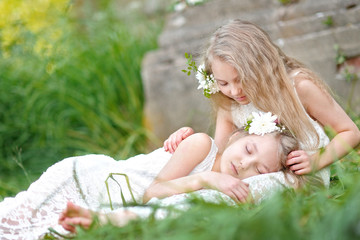 Portrait of two little girls twins