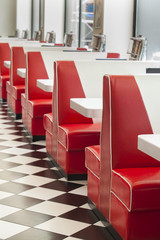 seating booth details in american diner restaurant, shallow DOPF - obrazy, fototapety, plakaty