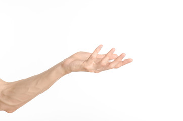 Hand gestures theme: the human hand shows gestures isolated on white background in studio