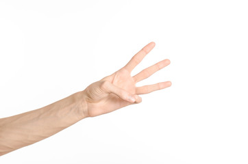Hand gestures theme: the human hand shows gestures isolated on white background in studio
