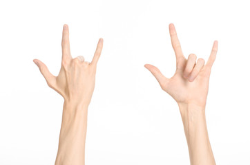 Hand gestures theme: the human hand shows gestures isolated on white background in studio