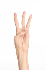 Fototapeta premium Hand gestures theme: the human hand shows gestures isolated on white background in studio
