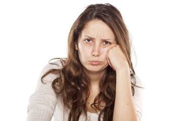 Fototapeta premium sulk young woman on a white background