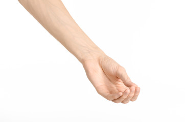 Hand gestures theme: the human hand shows gestures isolated on white background in studio