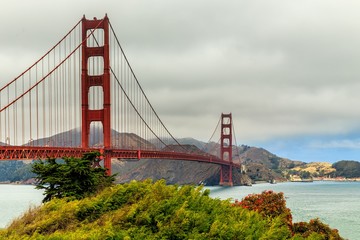 Golden gate in mist