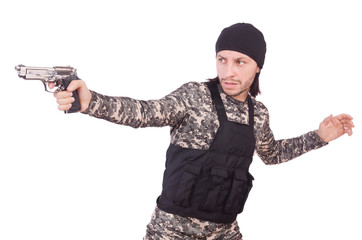 Young man in military uniform holding gun isolated on white