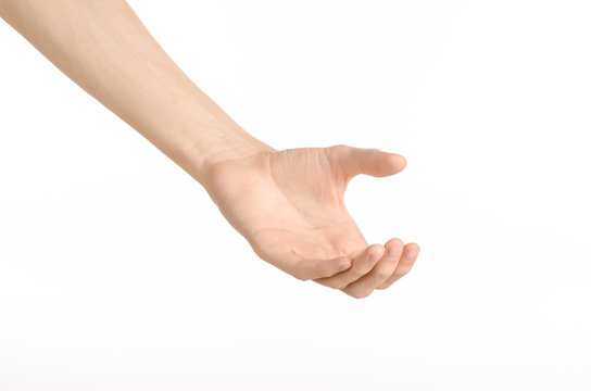 Hand gestures theme: the human hand shows gestures isolated on white background in studio