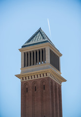 Fototapeta na wymiar One of the two Venetian towers located at Placa de Espanya in Barcelona, Spain