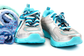 Sports Shoes, measuring tape, towel. Fitness concept.