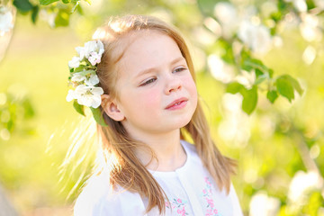 Fototapeta premium portrait of little girl outdoors in summer