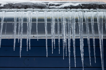 Icicles on the roof. winter season
