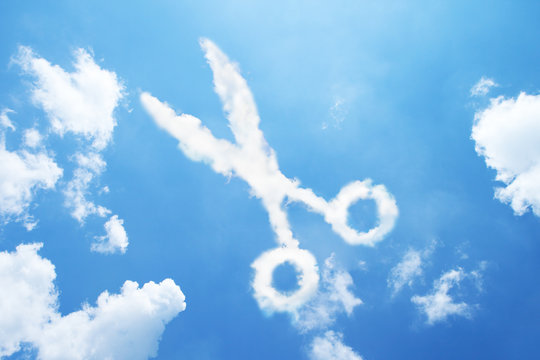 Scissors cloud shape on sky.