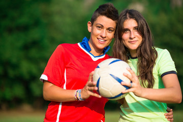 Fototapeta premium Two girl soccer players