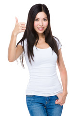 Fototapeta premium Young woman showing thumb up