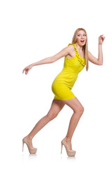 Pretty tall woman in short yellow dress isolated on white