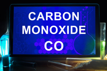 Tablet with chemical formula of  carbon monoxide. 