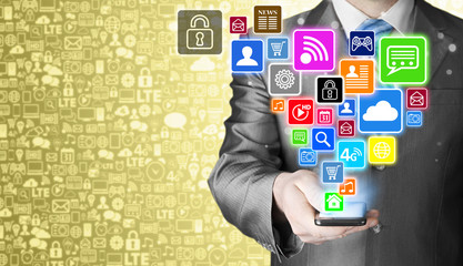 Business man using smart phone with social media icon set