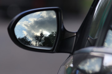 Obraz premium car rearview mirror reflection