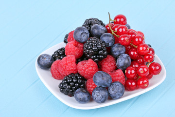 Assortment of berries on white plate