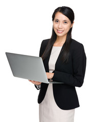 Asian businesswoman use of the laptop computer