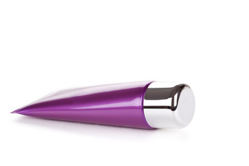 Tube with cream on white background