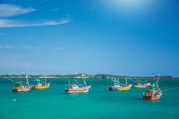 Obraz premium Fishing boat in beautiful ocean