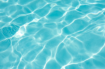 Blue water surface in swimming pool