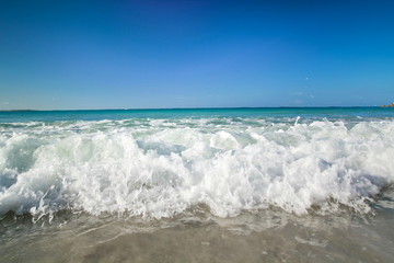 Tropical beach of Atlantic ocean with big waves