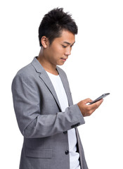 Young businessman use of the mobile phone